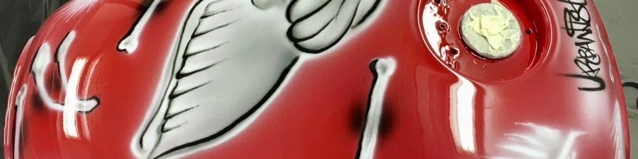 Motorcycle fuel tank with custom airbrushed artwork